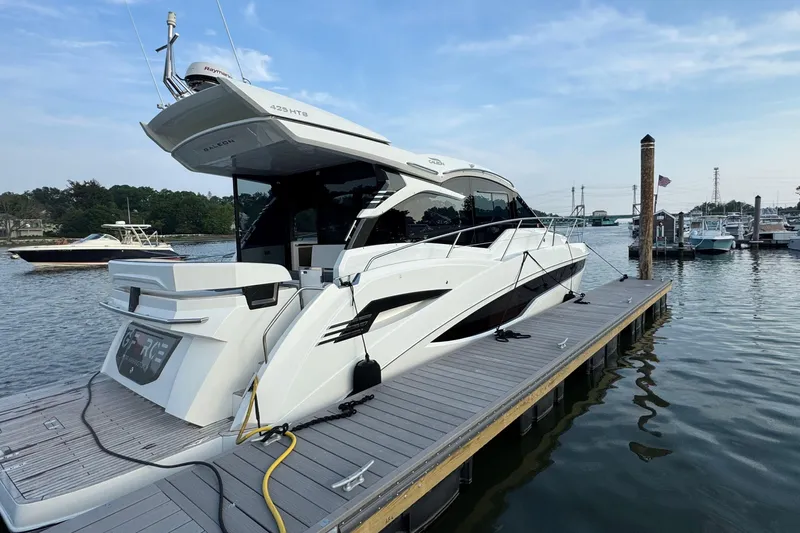  Yacht Photos Pics 2024 Galeon 425 HTS yacht docked at marina, sleek design, sunny day.