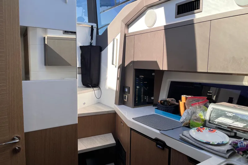  Yacht Photos Pics 2024 Galeon 425 HTS yacht interior with modern kitchen and sleek cabinetry.