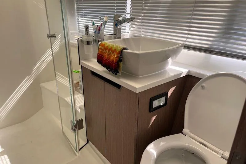 Yacht Photos Pics Modern bathroom in 2024 Galeon 425 HTS yacht with sleek fixtures and stylish design.
