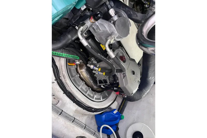  Yacht Photos Pics Engine compartment of 2024 Galeon 425 HTS yacht, showcasing mechanical components and hoses.