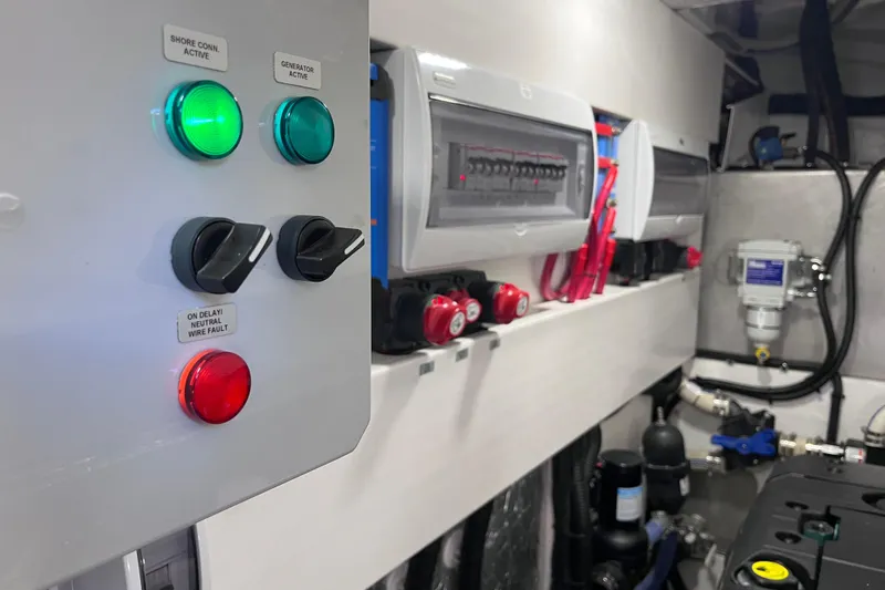  Yacht Photos Pics Electrical control panel inside 2024 Galeon 425 HTS yacht, featuring switches and indicators.