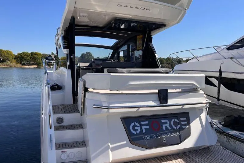  Yacht Photos Pics 2024 Galeon 425 HTS yacht docked, showcasing sleek design and modern features.