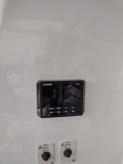 Trades Welcome Yacht Photos Pics Kicker audio control panel on a 1999 Carver 530 Voyager Pilothouse.