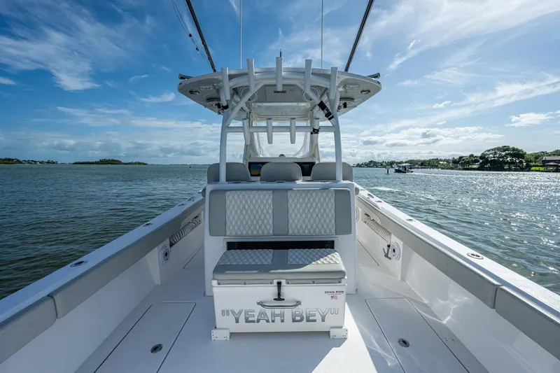 Yea Bey Yacht Photos Pics 2021 Front Runner 36 Center Console boat on calm waters under a clear sky.