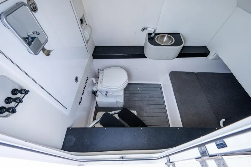 Yea Bey Yacht Photos Pics 2021 Front Runner 36 Center Console boat interior with toilet and sink.
