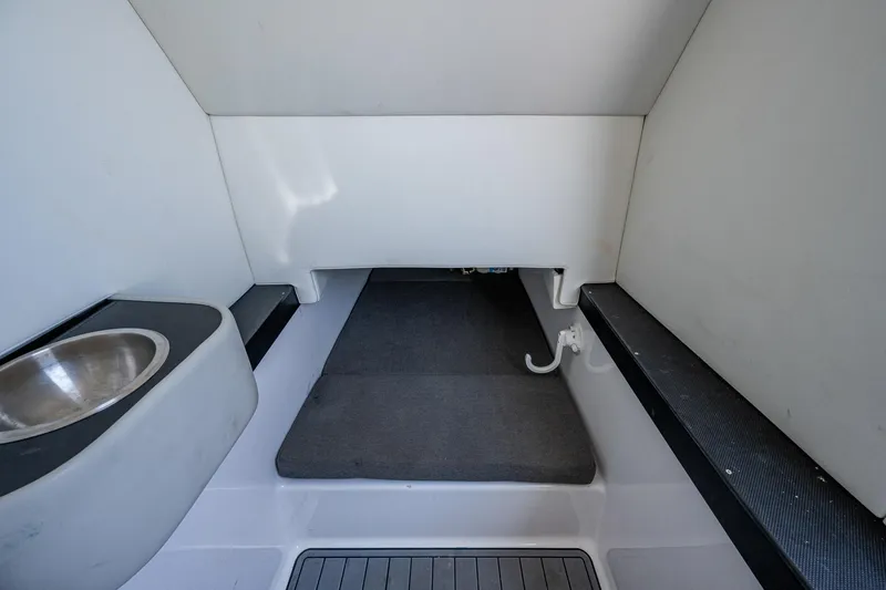 Yea Bey Yacht Photos Pics 2021 Front Runner 36 Center Console cabin interior with bed and sink.