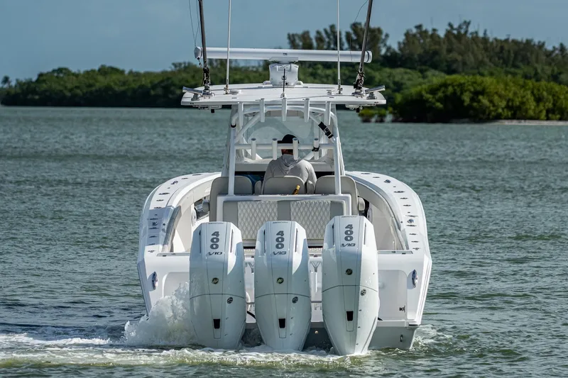 Yea Bey Yacht Photos Pics 2021 Front Runner 36 Center Console boat with triple 400 engines on water.