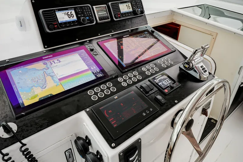 Archangel Yacht Photos Pics Cockpit of 1992 Viking 43 Open yacht with advanced navigation systems and controls.