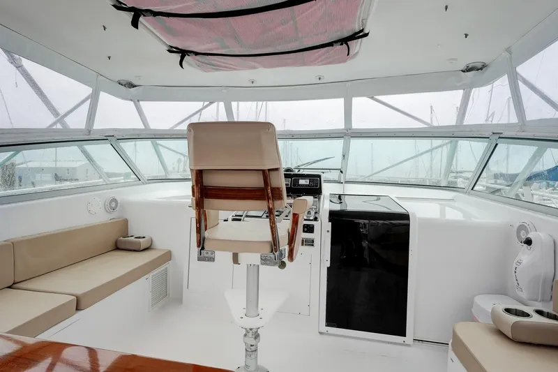 Archangel Yacht Photos Pics Interior of 1992 Viking 43 Open yacht with helm and seating area.