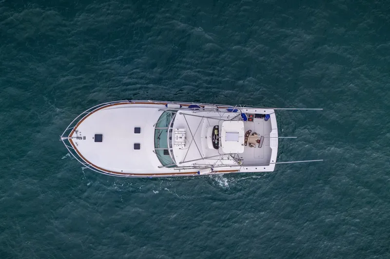 Archangel Yacht Photos Pics Aerial view of 1992 Viking 43 Open yacht cruising on the ocean.