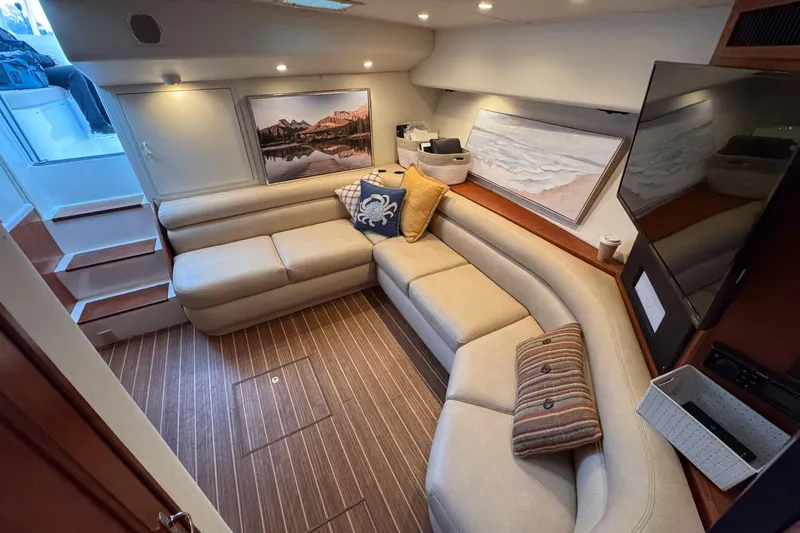 Archangel Yacht Photos Pics Luxurious interior of a 1994 Viking 43 Open yacht with elegant seating and decor.