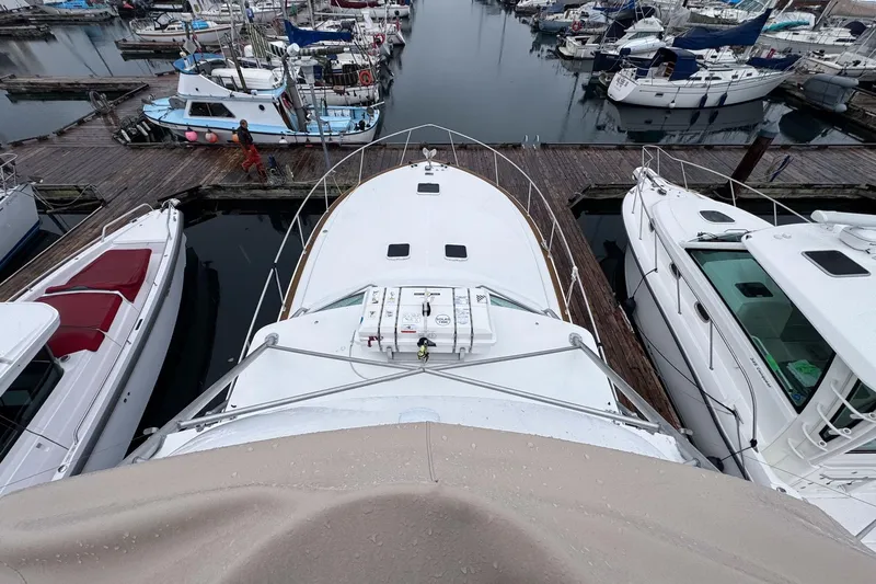 Archangel Yacht Photos Pics Aerial view of 1992 Viking 43 Open yacht docked among other boats.