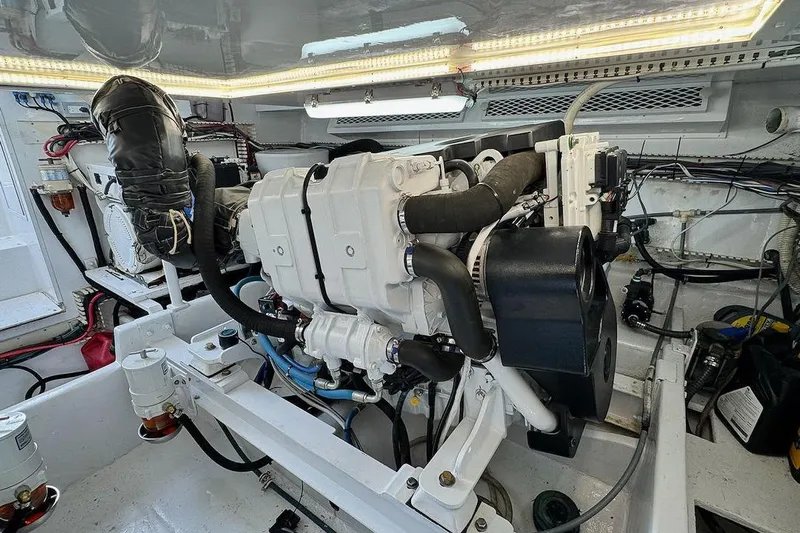 Archangel Yacht Photos Pics Engine room of a 1992 Viking 43 Open boat, showcasing detailed machinery and components.