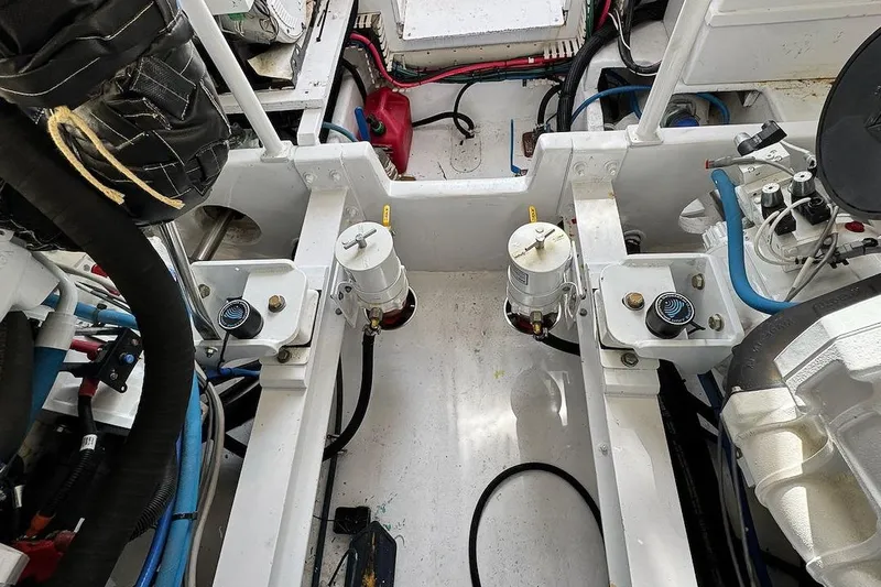 Archangel Yacht Photos Pics Engine room of 1992 Viking 43 Open boat, showcasing mechanical components and wiring.