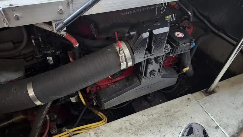  Yacht Photos Pics Engine compartment of a 2005 Carver 420 Mariner with visible Volvo Penta components.