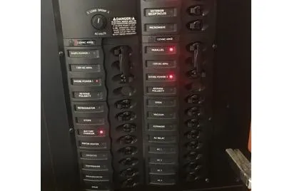  Yacht Photos Pics Electrical panel of 2005 Meridian 368 Motoryacht with labeled switches and indicators.