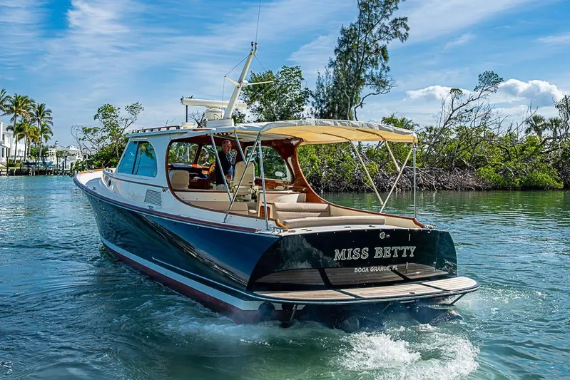 Miss Betty Yacht Photos Pics 2002 Hinckley Talaria 40 yacht "Miss Betty" cruising in scenic waters.
