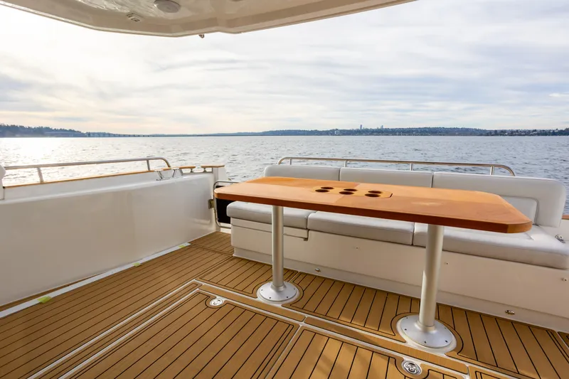 Tui Yacht Photos Pics Luxury deck of 2023 Greenline 48 Fly yacht with scenic water view.