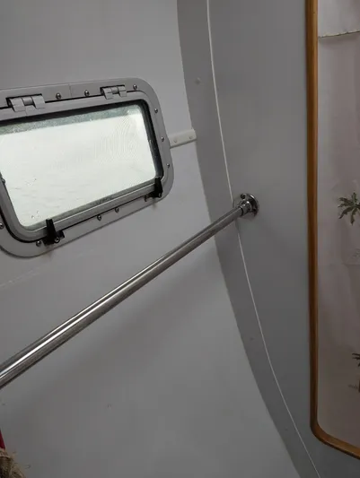  Yacht Photos Pics Interior of 2000 Manta 42 boat with window and metal handrail.