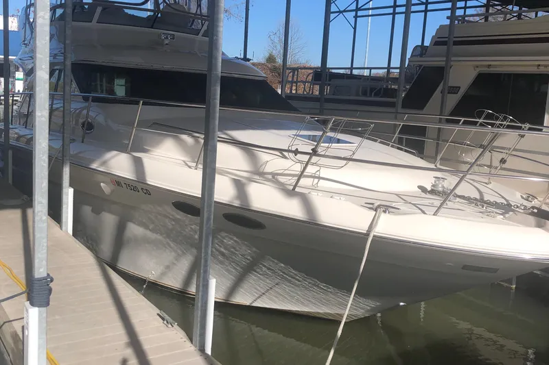 Callie B Yacht Photos Pics 2001 Sea Ray 400 Sedan Bridge yacht docked in marina.