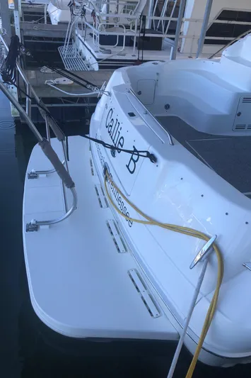 Callie B Yacht Photos Pics 2001 Sea Ray 400 Sedan Bridge docked, rear view with "Callie B" name visible.