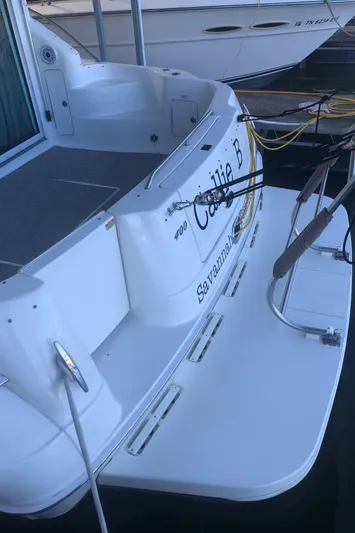 Callie B Yacht Photos Pics 2001 Sea Ray 400 Sedan Bridge yacht docked, rear view with name "Callie B".