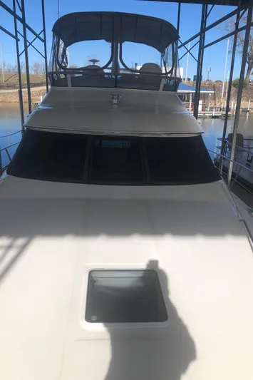 Callie B Yacht Photos Pics 2001 Sea Ray 400 Sedan Bridge yacht docked in marina.