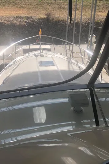 Callie B Yacht Photos Pics 2001 Sea Ray 400 Sedan Bridge yacht deck view in sunlight.