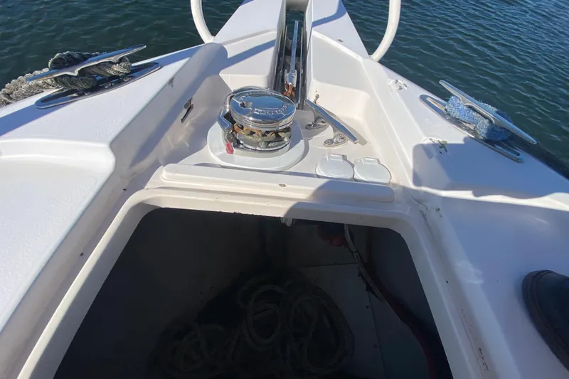  Yacht Photos Pics 2001 Intrepid 377 Walkaround boat deck with anchor storage and winch.