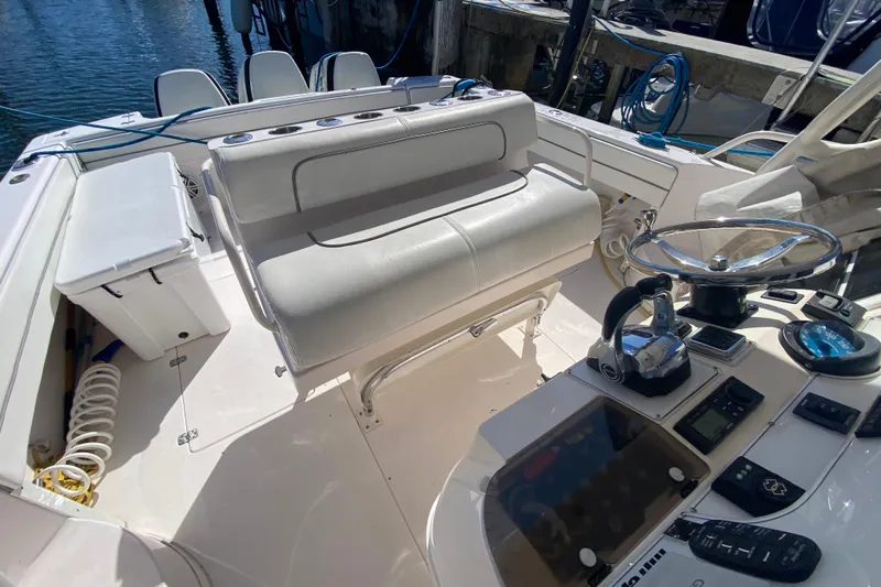  Yacht Photos Pics 2001 Intrepid 377 Walkaround boat cockpit with steering wheel and seating.