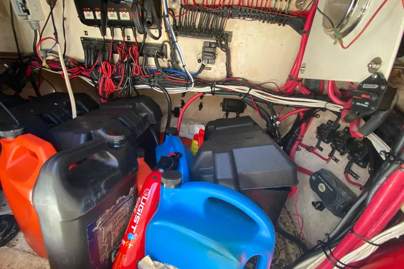  Yacht Photos Pics Engine compartment of a 2001 Intrepid 377 Walkaround with fuel containers and wiring.