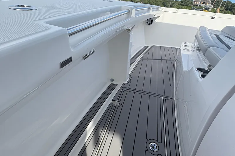 Hammercat 35-115 Yacht Photos Pics 2021 Hammer Yachts HammerCat 35 interior with sleek seating and modern flooring design.