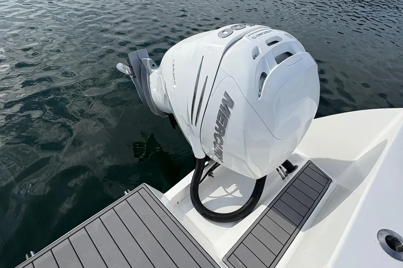 Hammercat 35-115 Yacht Photos Pics Outboard motor on 2021 Hammer Yachts HammerCat 35, docked on calm water.