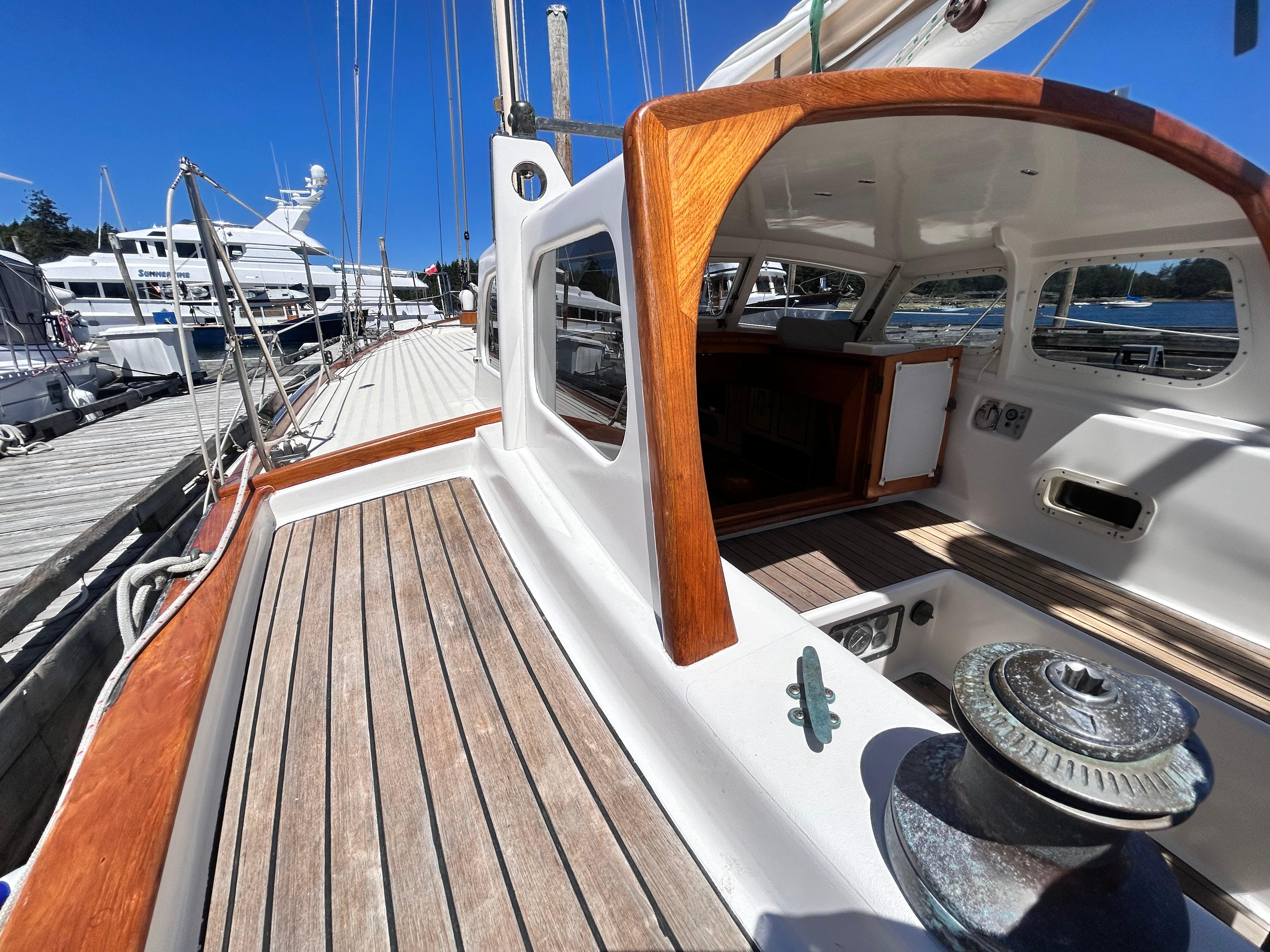 1927 Custom George Wayland 40 sailboat at dock, sunny day.