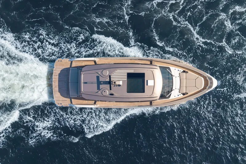  Yacht Photos Pics Aerial view of 2025 Azimut Seadeck 6 yacht cruising on open water.