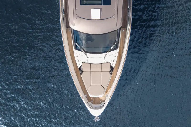  Yacht Photos Pics Top view of 2025 Azimut Seadeck 6 yacht on blue ocean water.