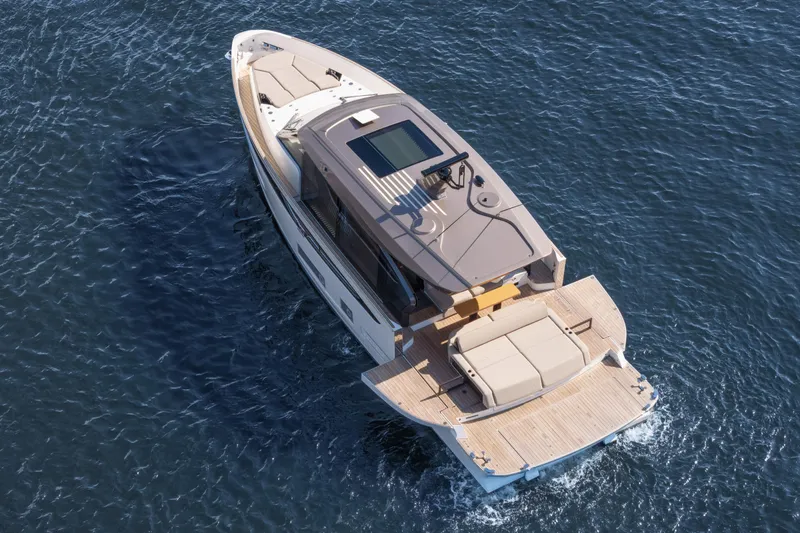  Yacht Photos Pics 2025 Azimut Seadeck 6 yacht cruising on open water, aerial view.