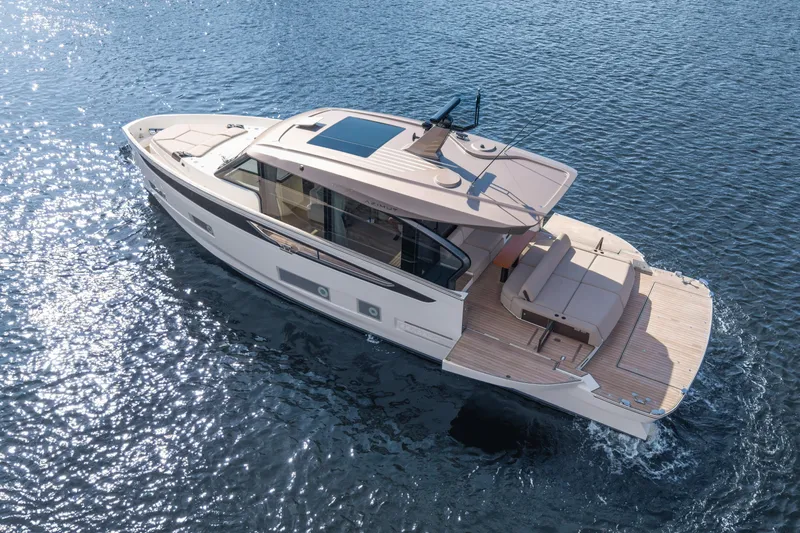  Yacht Photos Pics 2025 Azimut Seadeck 6 yacht cruising on sparkling blue water.