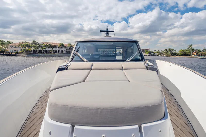  Yacht Photos Pics 2025 Azimut Seadeck 6 yacht with spacious deck, cruising on a sunny day.