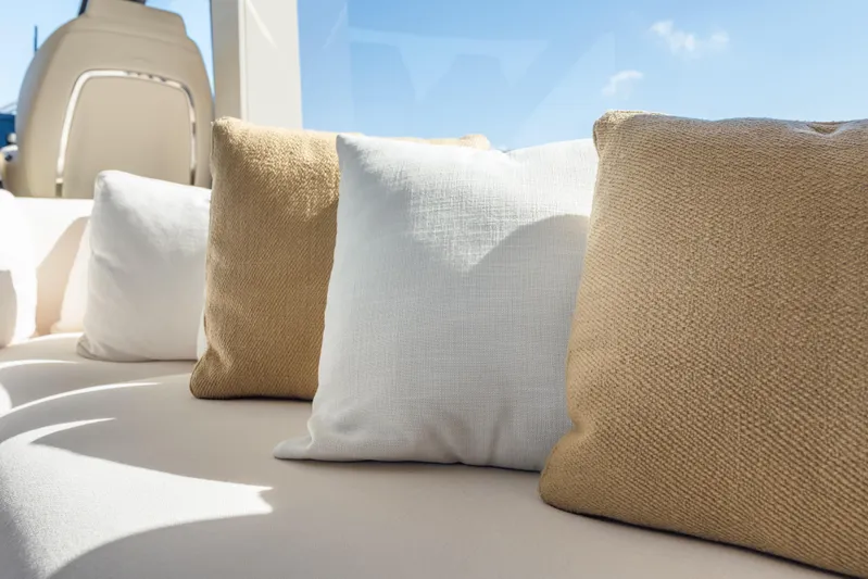  Yacht Photos Pics Luxurious seating with cushions on 2025 Azimut Seadeck 6 yacht, showcasing comfort and style.