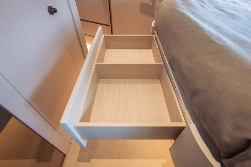  Yacht Photos Pics Open drawer in Azimut Seadeck 6 yacht, 2025 model, showcasing interior storage space.