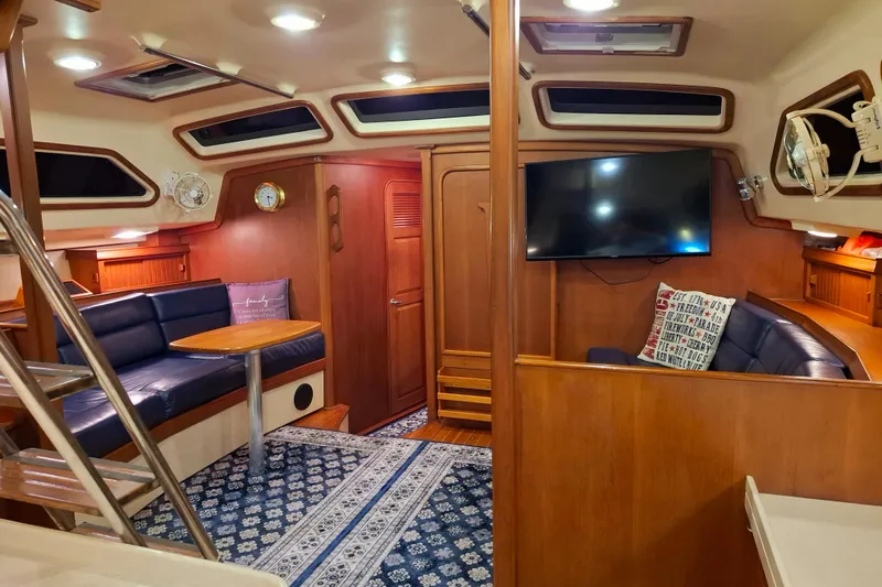 Priva Sea Yacht Photos Pics Luxurious interior of 2003 Island Packet 485 yacht with cozy seating and modern amenities.