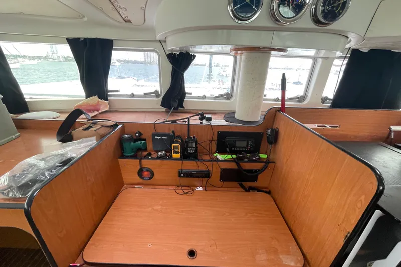 Futuna Yacht Photos Pics Interior of 2004 Lagoon 570 yacht with navigation equipment and ocean view.