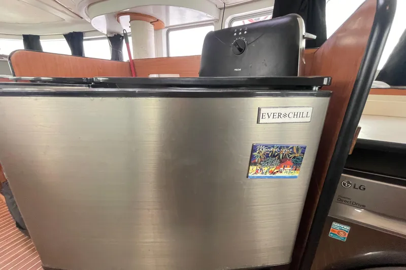 Futuna Yacht Photos Pics Stainless steel Everchill fridge in 2004 Lagoon 570 yacht interior.