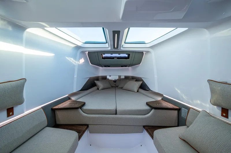 Chye-lukh Yacht Photos Pics Luxurious interior cabin of 2021 Axopar 37 boat with modern design and comfortable seating.