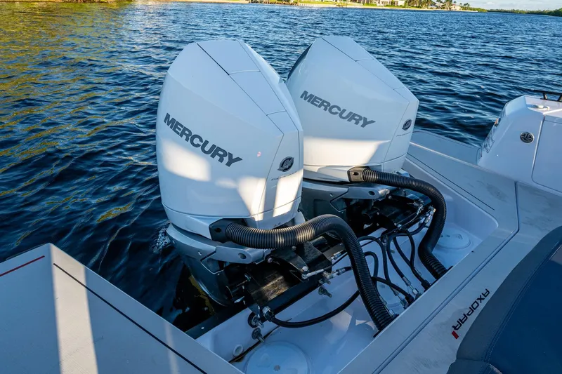 Chye-lukh Yacht Photos Pics 2021 Axopar 37 boat with dual Mercury outboard engines on water.