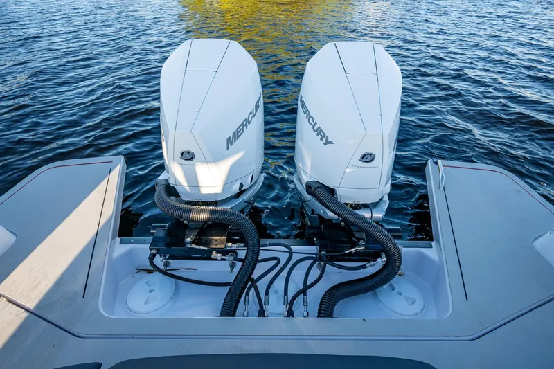 Chye-lukh Yacht Photos Pics 2021 Axopar 37 boat with dual Mercury outboard engines on water.