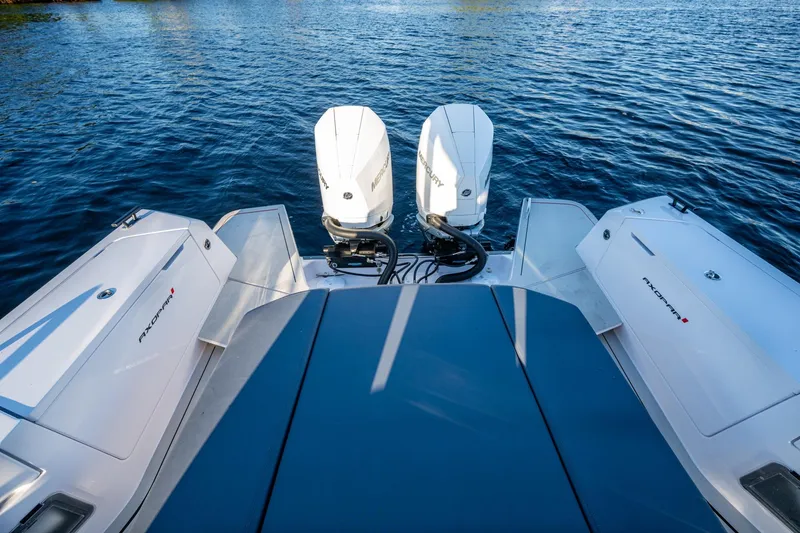 Chye-lukh Yacht Photos Pics 2021 Axopar 37 boat with dual Mercury outboard engines on water.