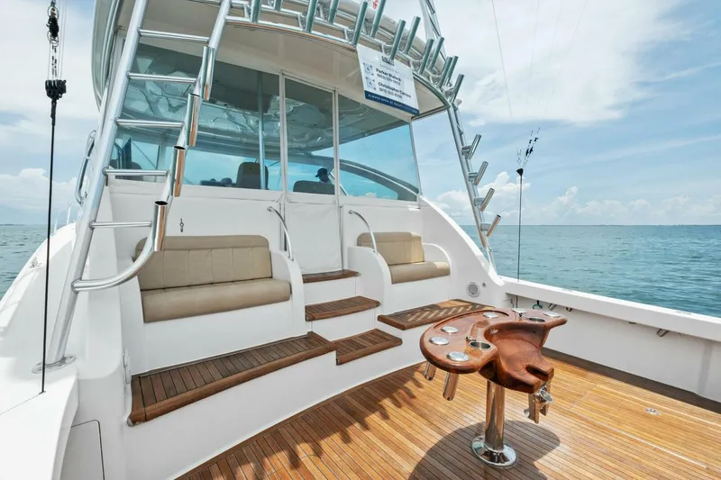 Terrabbean Yacht Photos Pics 2015 Viking 52 Open yacht with teak deck and fishing chair, ocean view.