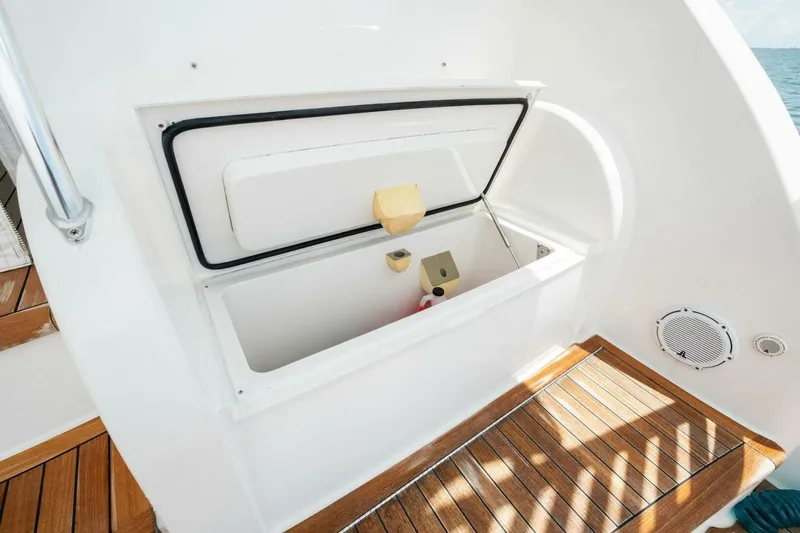 Terrabbean Yacht Photos Pics Open storage compartment on 2015 Viking 52 Open yacht with wooden deck.